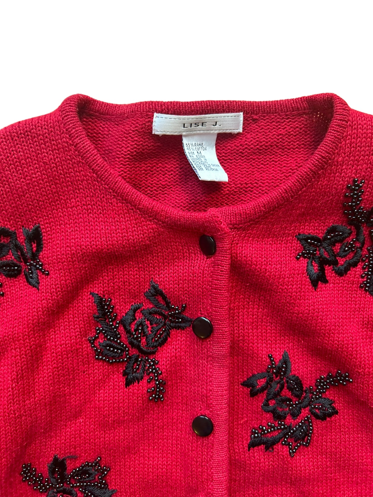 Lise J. Red Sweater